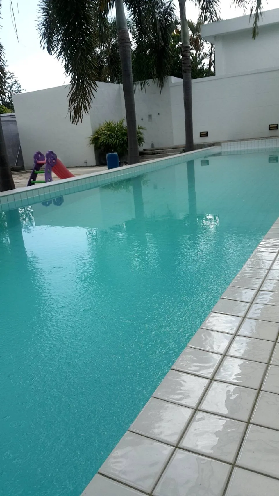 Private Villa — New Pool Steps — the pool refilled over the new steps