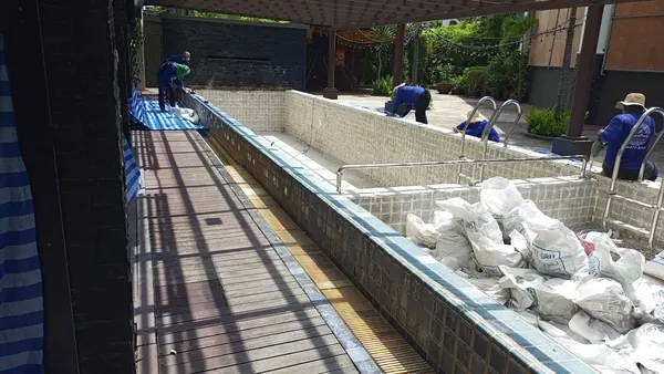 Andakira, Patong — the old finish cleared and the waste bagged