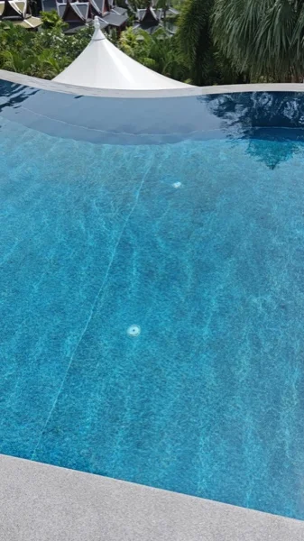 The new surround along the water's edge after the pool was refilled