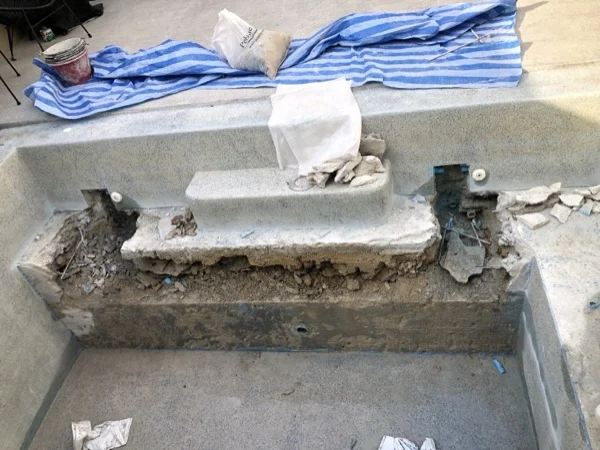 Private Residence, Bang Tao — the pool edge broken out to the pipework