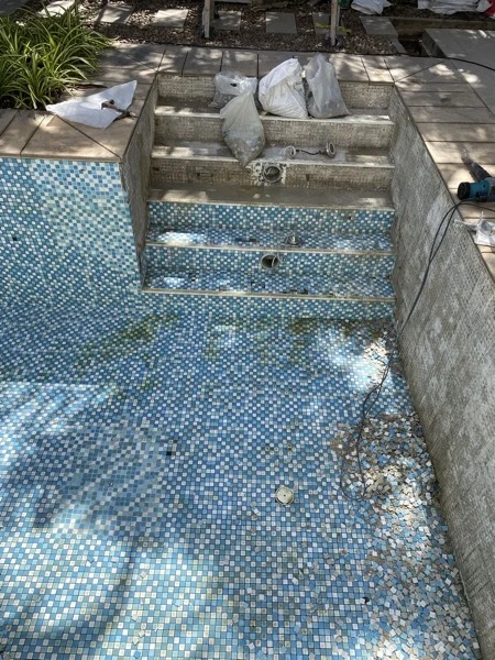 Private Residence, Bang Tao — the old mosaic coming off the floor