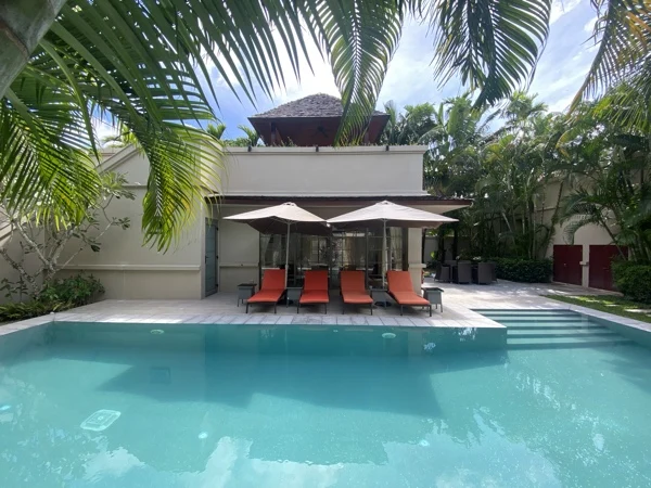 Private Residence, Bang Tao — the pool before the villa, under the palms
