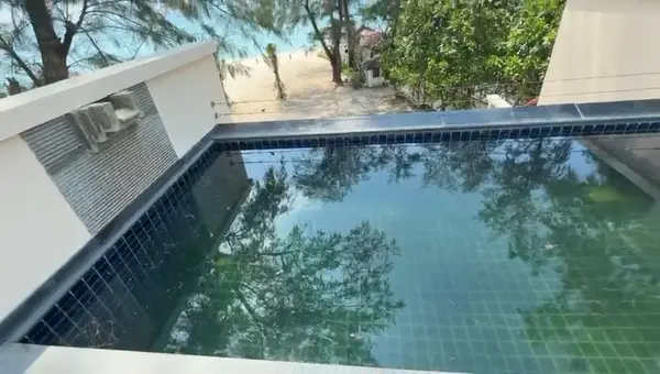Beachfront Villa, Laguna — the pool in March 2026, the water gone green