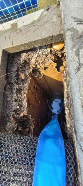 Beachfront Villa, Laguna — inside the overflow channel, the concrete badly worn