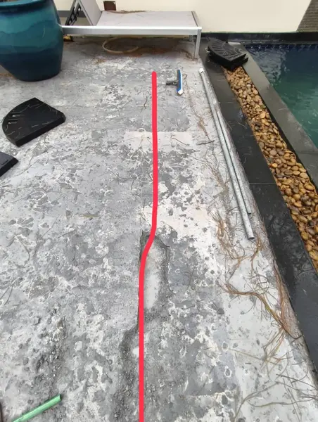 Beachfront Villa, Laguna — the old terrace floor, the delaminated area marked