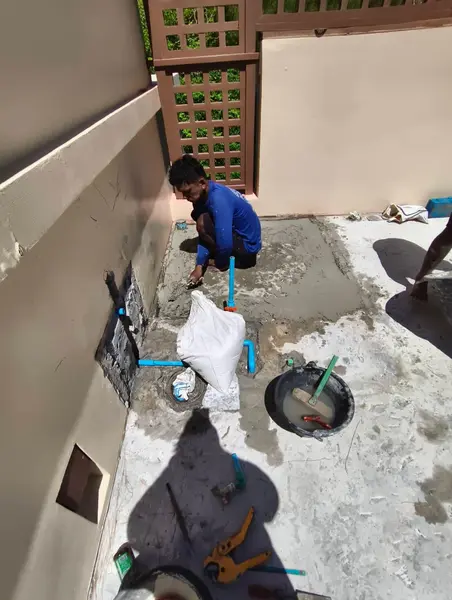Beachfront Villa, Laguna — new pipework and a relocated drain in the shower corner