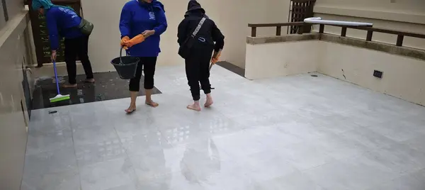 Beachfront Villa, Laguna — cleaning down the finished terrace