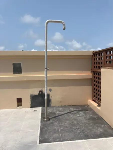 Beachfront Villa, Laguna — the new freestanding steel shower on its tiled pad