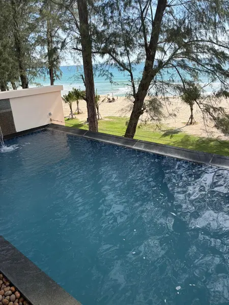 Beachfront Villa, Laguna — the pool running again after the restart, the water still clearing