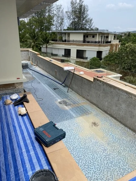Private Residence, Chom Tawan — the pool in its old blue mosaic