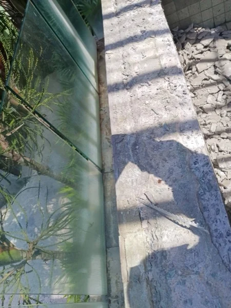 Crest Resort — the old surface coming off the wall
