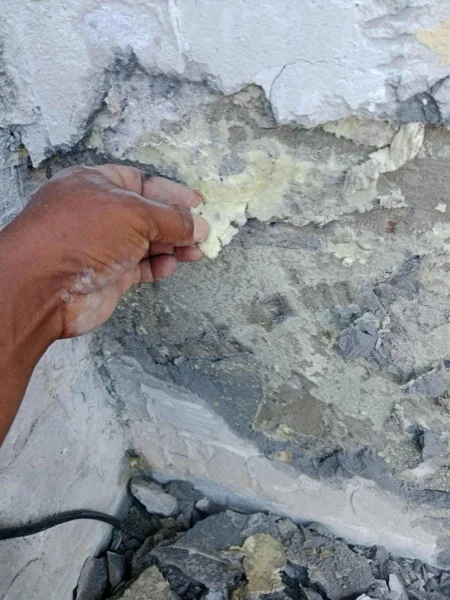 Crest Resort & Pool Villas — the failed plaster coming away from the pool wall
