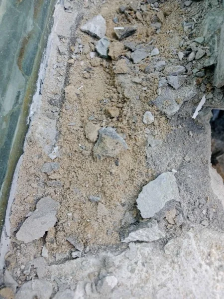 Crest Resort & Pool Villas — the old plaster broken down behind the wall