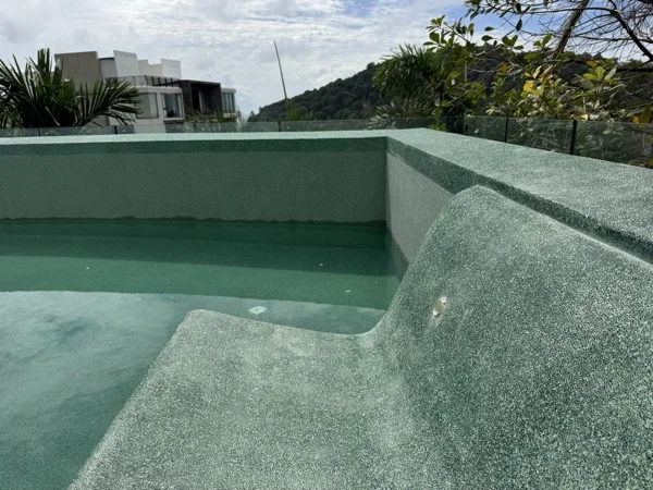Crest Resort & Pool Villas — the pool in its new finish before filling