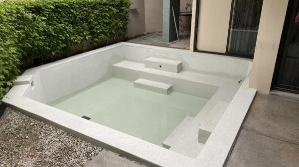 Dewa Resort — a villa plunge pool in its new finish, before filling