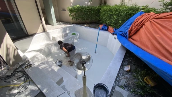 Dewa Resort — working in the plunge pool under the tarps