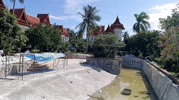 Five-Villa Lagoon Pool — the old finish demolished, plastering under way