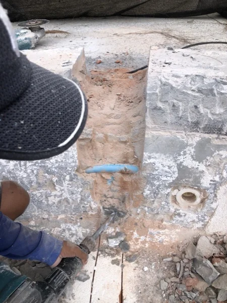 Five-Villa Lagoon Pool — digging out the old jacuzzi fittings