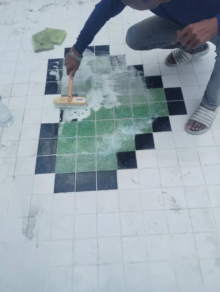 Heart Shape Feature on Pool Floor — washing off the fresh finish in the heart