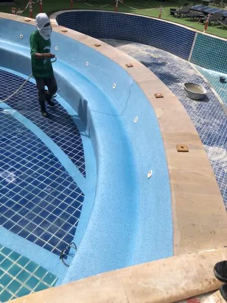 Karon Butterfly Condominium — washing the new finish on the bench