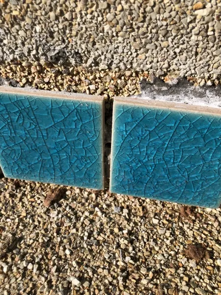 Karon Butterfly Condominium — tiles coming away from the old sandwash