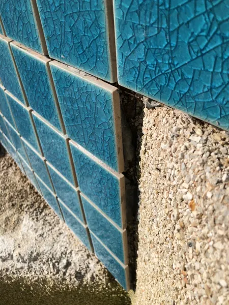 Karon Butterfly Condominium — loose tiles at the corner
