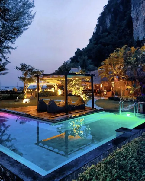 Mama Beach Residence, Phi Phi — the pool and pavilion at dusk