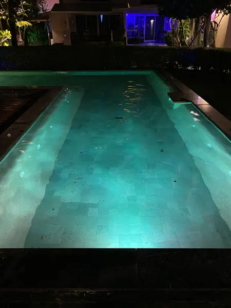 Mama Beach Residence, Phi Phi — the pool floor and ledge, lit