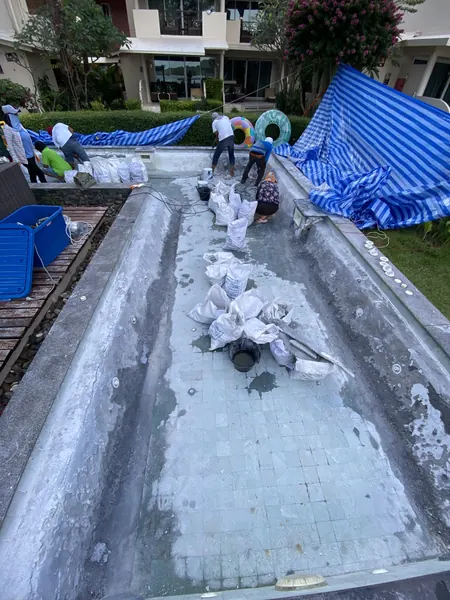 Mama Beach Residence, Phi Phi — demolition waste bagged in the pool