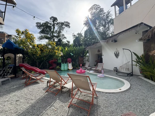 NY Kids, Nai Yang — the pool and terrace in the evening