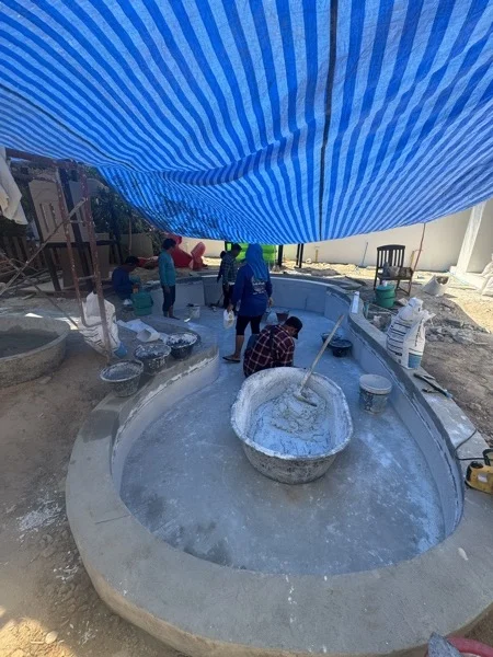 NY Kids, Nai Yang — the pool under shade netting during the works