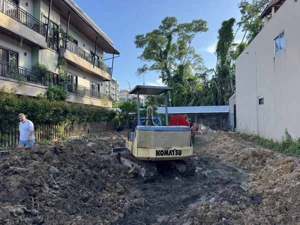 NY Kids, Nai Yang — clearing the site for the new pool