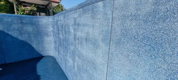 The Riviera Pearl finish photographed dry on the pool wall after washing back