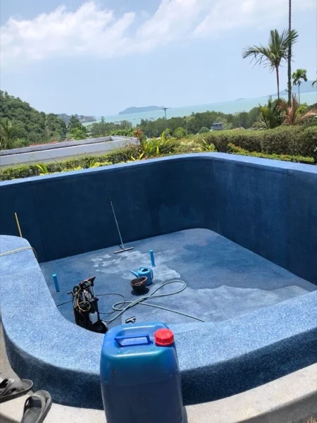 The pool with the Riviera Pearl finish complete and the shell still empty, the sea in the distance