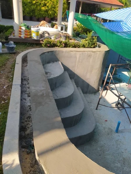 The entry steps re-formed in fresh render before the finish was laid