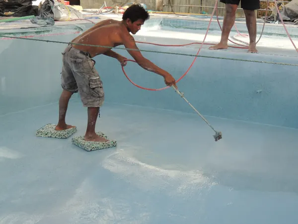 Private Villa, Koh Phangan — washing the surface to expose the aggregate