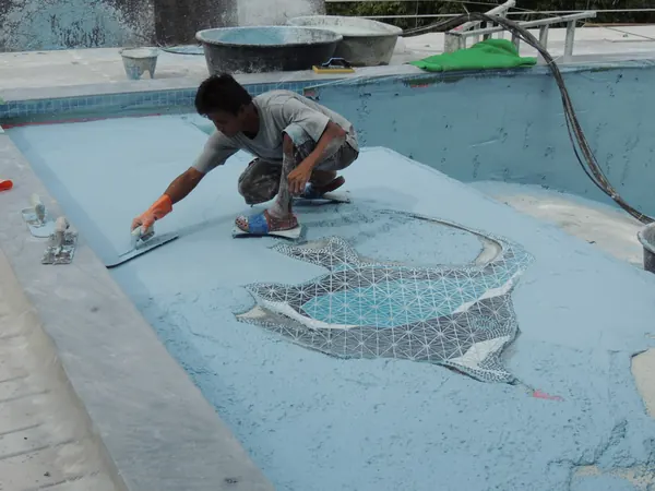 Private Villa, Koh Phangan — trowelling PebbleCrete around the mosaic fish