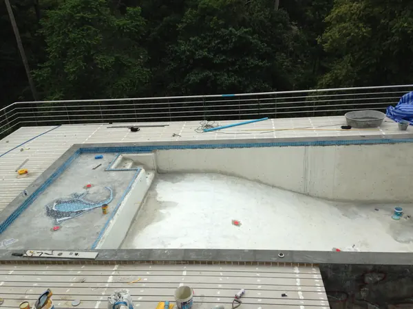 Private Villa, Koh Phangan — mosaic fish set into the floor, pool shell ready for the finish