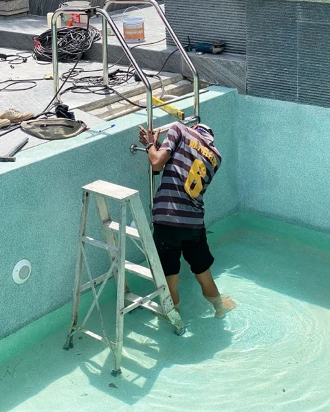 Banyan Tree Villa — installing the stainless steel ladder