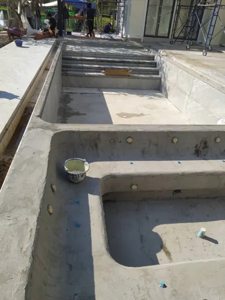 Private Villa, Laguna — Raindrop: the jacuzzi and its seat ledge before finishing