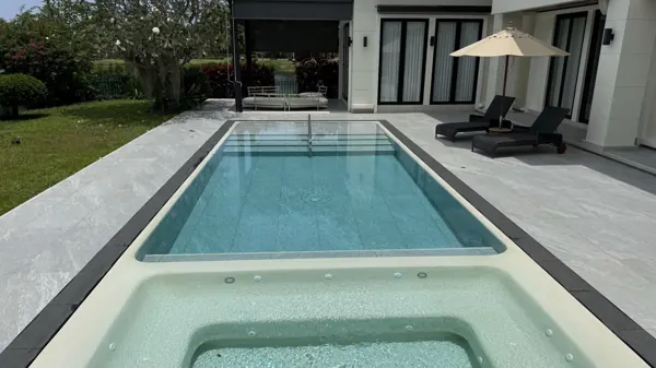 Private Villa, Laguna — Raindrop: the villa pool with the jacuzzi in Glass Raindrop