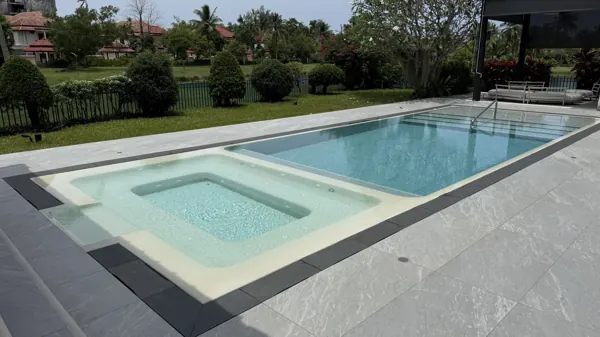 Private Villa, Laguna — Raindrop: the white jacuzzi set into the pool