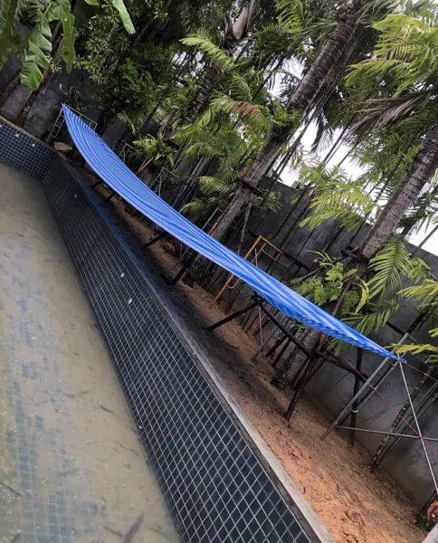 Private Villa, Layan — the tiled pool before the new coping