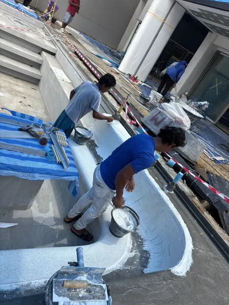 Private Villa, Layan Beachfront — applying the finish in the curved lounge