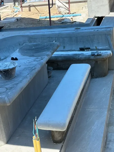 Private Villa, Layan Beachfront — a finished bench while work goes on around it