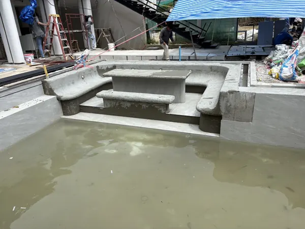 Private Villa, Layan Beachfront — the sunken lounge with its table and benches, before the finish