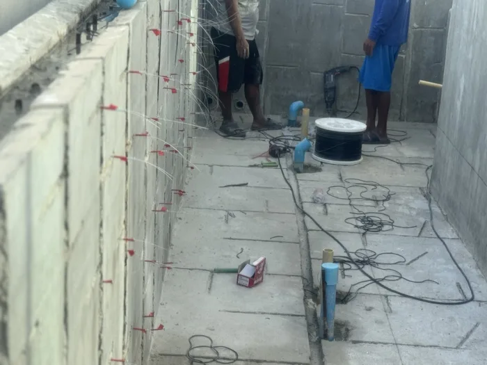 Private Villa, Nai Yang — Atoll Pearl — pulling the fibre-optic cable inside the shell