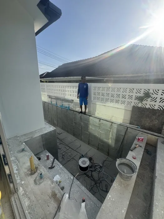 Private Villa, Nai Yang — Atoll Pearl — setting the fibre-optic fittings into the pool wall