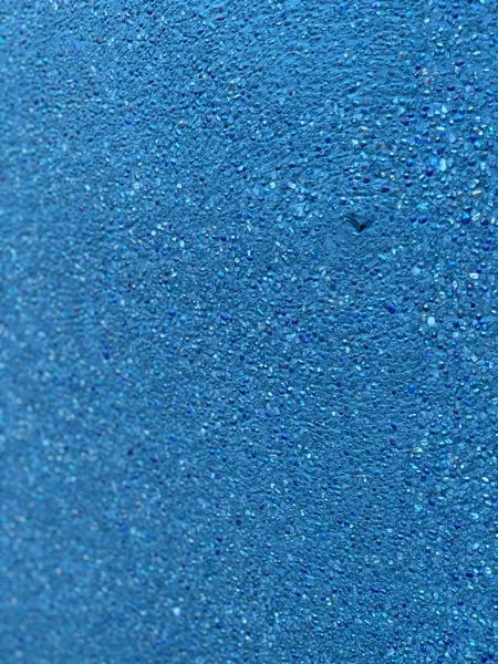 The Royal Blue finish at close range, showing the spread of glass beads in the matrix
