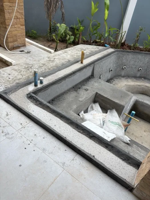 Private Villa, Pasak — the coping formed around the pool and the round recess